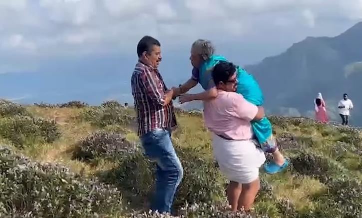 Sons Carry 87-Year-Old Mother On Shoulder To Fulfill Her Wish To Witness Neelakurinji Bloom